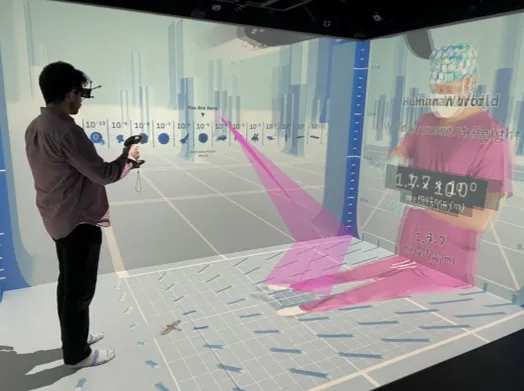 User standing in CAVE virtual reality environment